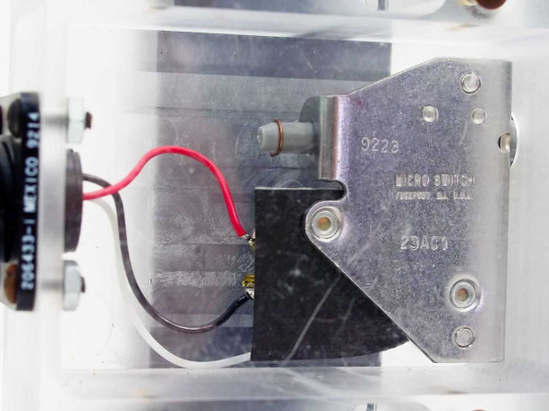 Close-up of internal Micro Switch microswitch module — model 9228 and 23AC0 markings legible, red wiring visible, Freeport IL USA label