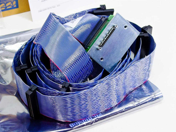 Kingston DCREMLVD-KIT internal SCSI ribbon cable coil with LVD/SE multi-mode terminator module and connectors visible
