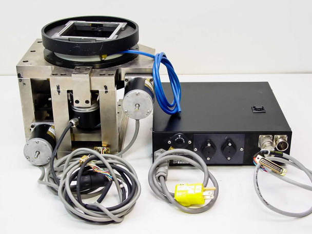 Full system rear view showing rotary stage with two Parker Compumotor stepping motors, EXE 702B interface unit with rear panel connectors and cabling