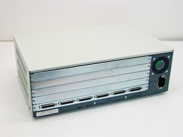 MICOM Marathon 1K 5001B/D Network Feeder Multiplexer — rear panel showing six DB25 connectors, IEC power inlet, and cooling fan