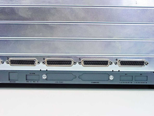 MICOM 5001B/D Network Feeder Multiplexer — close-up of rear DB25 ports numbered 3 through 6 with alarm, log port, command, and DIP switch sections