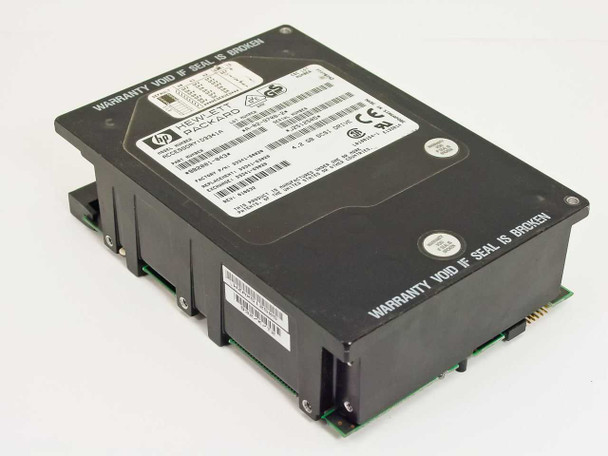 HP Hewlett-Packard D3341A 4.2GB SCSI Hard Drive — three-quarter top view showing label with model and part number details