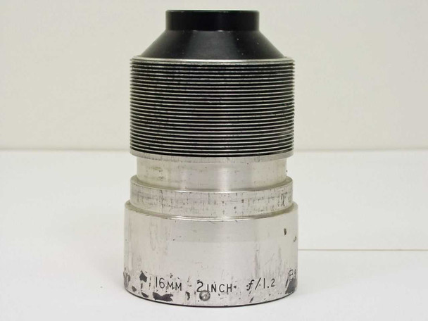 Bell & Howell 2-inch 16mm f/1.2 projection lens — side view showing engraved '16MM 2 INCH f/1.2' specification markings on lower barrel