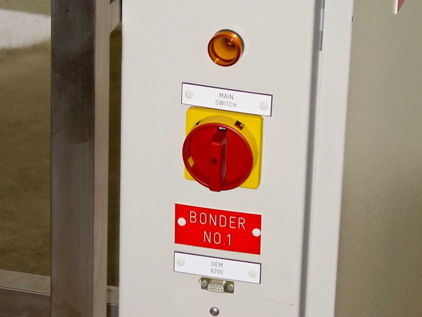 HyBond 616-12 power column side panel showing main rotary switch, amber indicator light, BONDER NO.1 label, and DB9 DEM port
