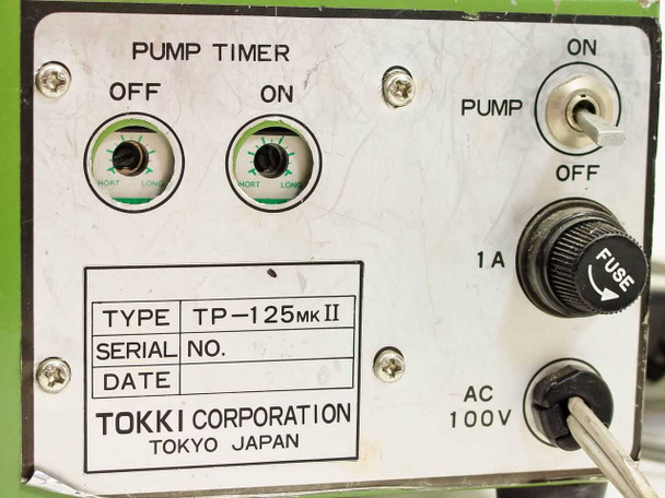 Rear control panel of TP-125mk2 showing Pump Timer OFF/ON dials, PUMP on/off switch, 1A fuse, AC 100V inlet, and Tokki Corporation Tokyo Japan label plate