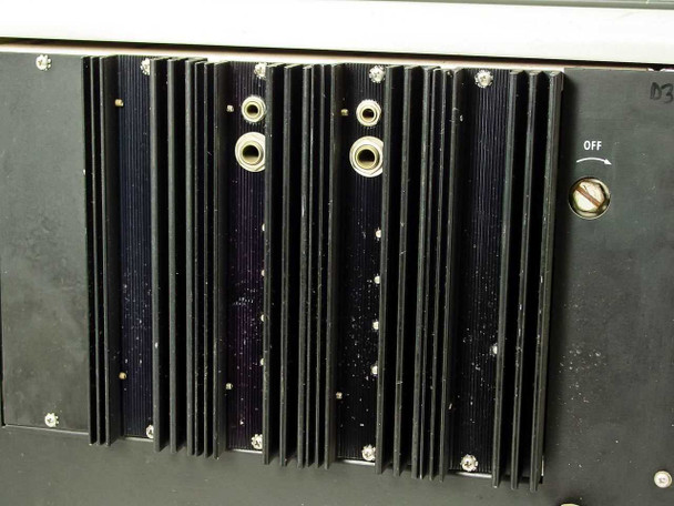 System 2000 rear card slot section – four finned heatsink amplifier modules installed in card cage, with OFF screw and mounting hardware visible