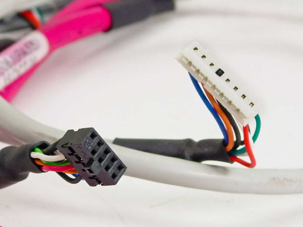 Close-up of internal cable harness connectors including black multi-pin header and white multi-pin connector