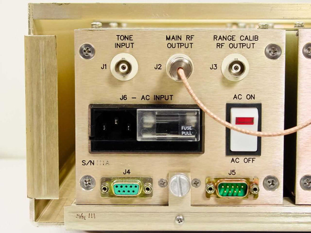 Rear panel of 3dbm 70MDF-GLW modulator plug-in showing Tone Input J1, Main RF Output J2, Range Calib RF Output J3 BNC connectors, IEC AC input J6 with fuse pull, AC ON/OFF switch, and DB9 serial connectors J4 and J5