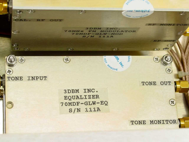 Close-up of internal 3dbm sub-assembly labels: 70MDF-GLW-MOD 70MHz FM Modulator and 70MDF-GLW-EQ Equalizer modules with Tone Input, Tone Out, Tone Monitor, and CAL RF Out connections visible