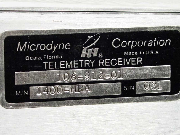 Microdyne 1400-MR data plate showing model number 1400-MRA, part number 106-912-01, serial number 031, and Microdyne Corporation Ocala Florida Made in USA label