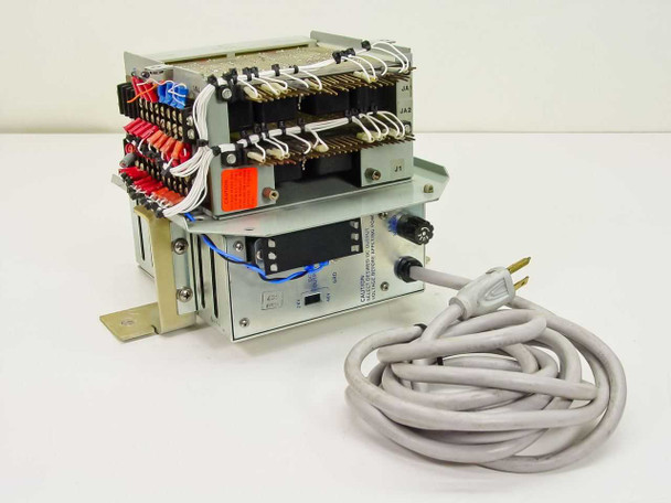 Rockwell 8548-00 Power Supply with Wescom 401 amplifiers — rear/side view showing wiring harness connections, terminal blocks, and AC power cord