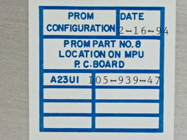 PROM configuration label showing date 2-16-94, PROM part number 105-939-47, location A23UI on MPU PCB