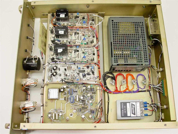 Interior top view of Hughes FM Data Detector showing circuit boards, wiring, Lambda power supply, and Acopian power module