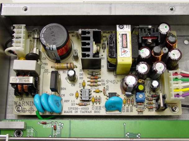 Leitch VGD-3200E internal power supply board close-up showing UPS30-4003 module marked Made in Taiwan ROC, Rev 1.1