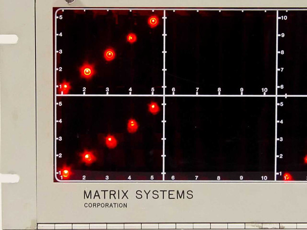 Close-up of Matrix Systems 10360 red LED matrix display showing illuminated dot pattern across upper and lower grid quadrants