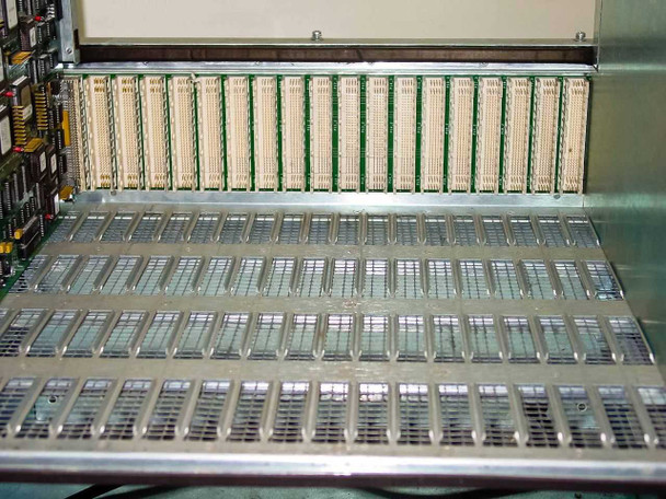 General Instrument CLI Magnitude MPEG Encoder 410111-01 — interior view showing row of installed encoder/compressor cards with heat sink fins and backplane