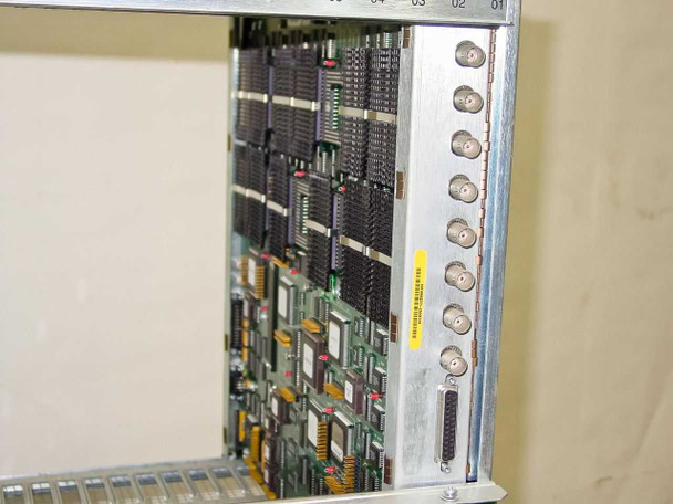 General Instrument CLI Magnitude MPEG Encoder — interior rear card view showing multiple installed circuit boards with BNC output connectors and DB connector, numbered slots 01–05 visible