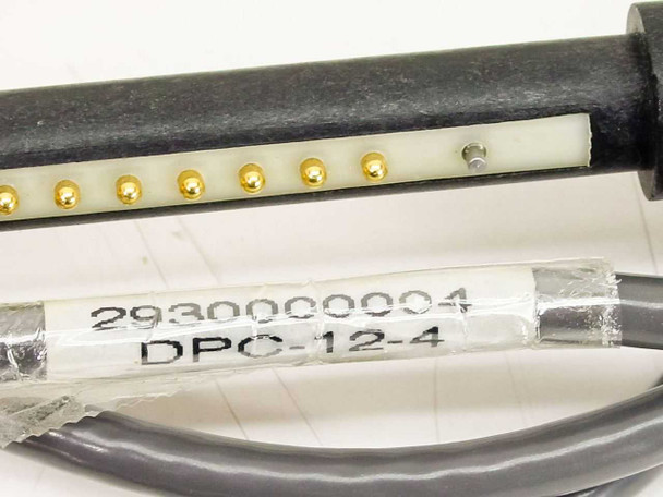 Dynatech DPC-12-4 label showing part number 2930000004 and model DPC-12-4 on gold pogo-pin connector