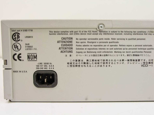 HP J2602A AdvanceStack rear label close-up showing power ratings 100-127V / 200-240V AC 50/60Hz 0.8A, label part number 5182-1718, Made in USA, and FCC/CSA markings