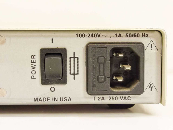 Cybex Commander Personal II power section close-up – rear label showing 100-240V ~, 0.1A, 50/60 Hz input rating, T 2A 250VAC fuse, IEC power inlet, power switch, and Made in USA marking