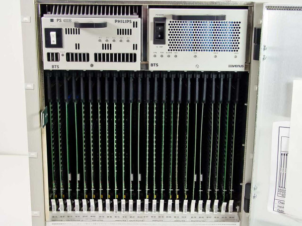 Interior of RF-401 chassis with door open showing PS-400B and PS-400A power supply modules and populated card slots with VS-400 matrix cards