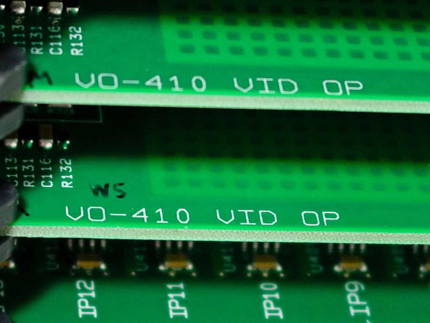 Close-up of VO-410 VID OP output module circuit boards showing silkscreen markings and VO-410 VID OP designation