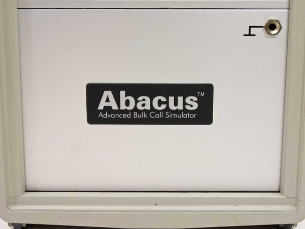 Zarak Abacus Advanced Bulk Call Simulator front badge — close-up of black Abacus trademark panel label and small connector upper right