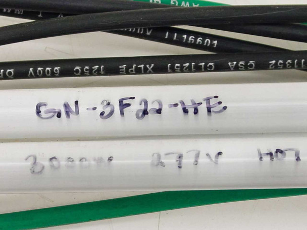 Titan Industrial GN-3F22-HE label showing part number GN-3F22-HE, 3000W, 277V, H07 handwritten on white sleeve; wire jacket printed with CSA CL1251 XLPE 600V 125C 12 AWG