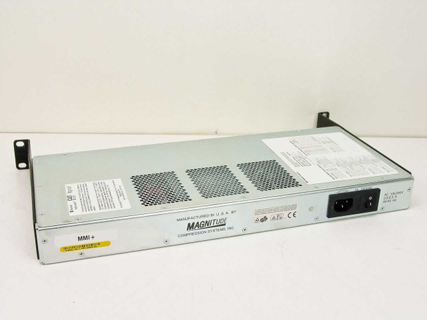 General Instrument Magnitude MMI+ 410802-03 – rear/bottom view showing IEC AC power inlet, on/off rocker switch, ventilation grilles, and Magnitude Compression Systems Inc. label