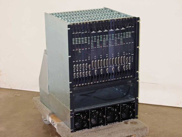 CLI Compression Labs Magnitude MPEG-2 DVB satcom multiplexer chassis — three-quarter front-left view showing full populated card cage on pallet