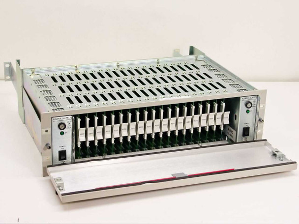 BTS RF-3000A rack opened showing 19 BAA-3000 analog audio mono distribution amp cards installed with PA-3001 power supply module
