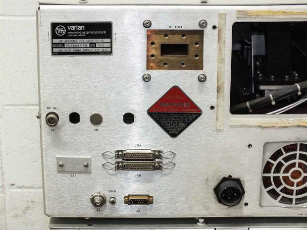 RF assembly rear panel showing RF OUT waveguide flange, RF IN port, JSA and JSB D-sub connectors, GND stud, J2 and J4 circular connectors — close-up