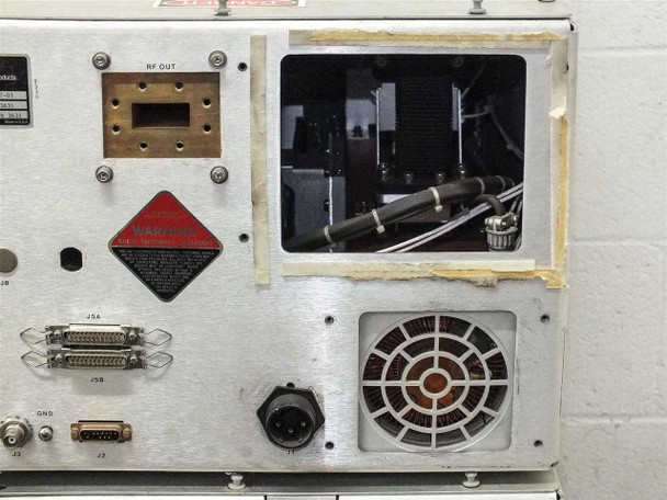 Close-up of RF assembly rear panel showing waveguide flange (RF OUT), open access panel revealing internal RF components and wiring, JSA/JSB connectors, and cooling fan