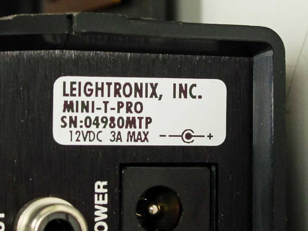 Leightronix Mini-T-Pro label showing model name, serial number SN:04980MTP, and 12VDC 3A Max power rating