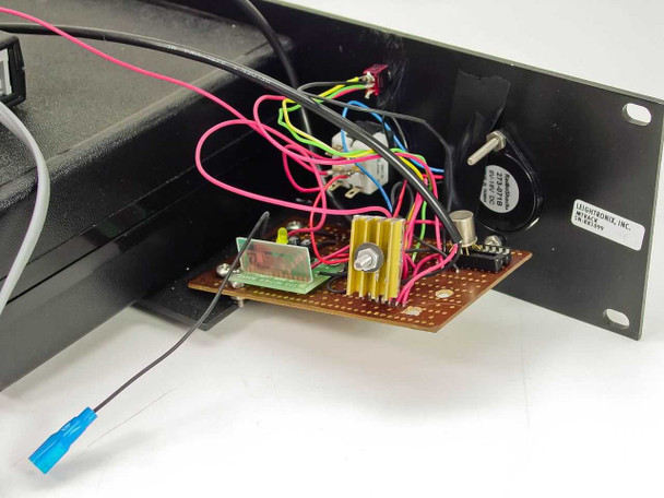 Leightronix Mini-T-Pro interior view showing internal circuit board with wiring and Leightronix label