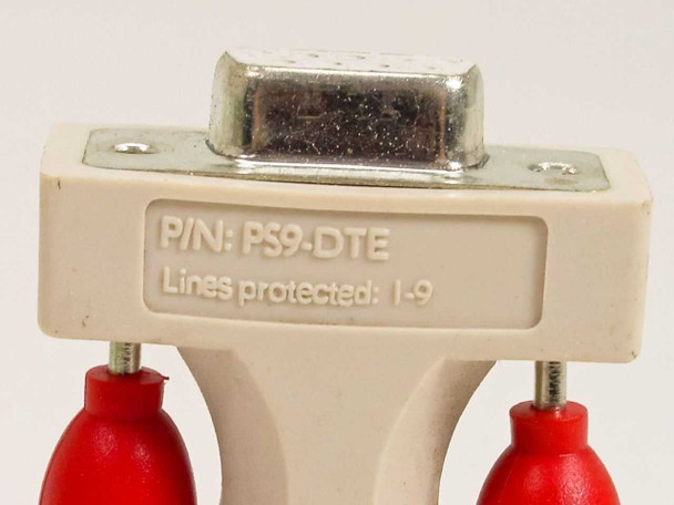 APC PS9-DTE ProtectNet close-up of label showing part number PS9-DTE and Lines Protected 1–9, with DB9 female connector visible above