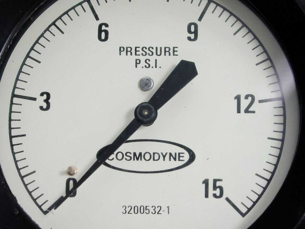 Cosmodyne 3200532-1 gauge face close-up showing PRESSURE P.S.I. label, black pointer, and 0-15 PSI scale markings