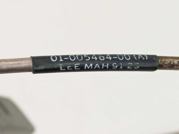 Semi-rigid RF cable label closeup showing part number 01-005464-00(A) and date code LEE MAH 91 25