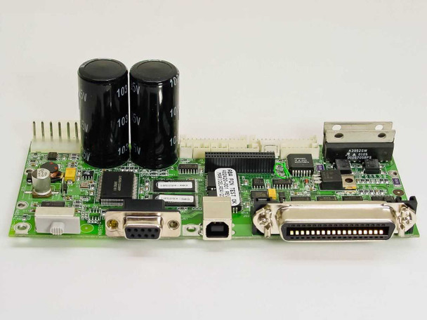 Zebra 402420-001 printer motherboard front view showing DB25 parallel port, DB9 serial port, USB port, and two large electrolytic capacitors