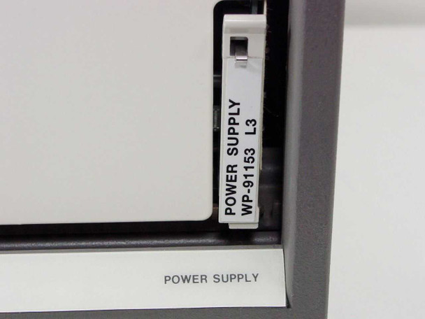 Avaya Definity ECS SD-66984-01 — close-up of empty power supply bay with WP-91153 L3 label tag visible; power supply not present