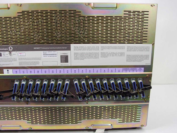 Avaya SD-66984-01 Definity ECS — rear panel lower close-up showing full row of backplane connectors, slot numbering strip, and partial serial/barcode label