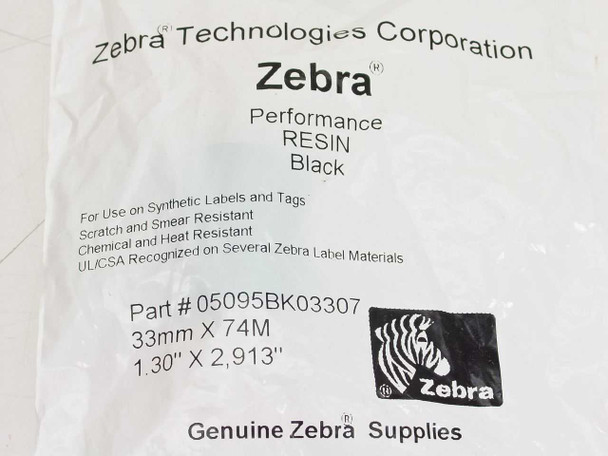 Zebra 05095BK03307 Performance Resin Black ribbon packaging close-up showing 33mm x 74M dimensions and Genuine Zebra Supplies logo