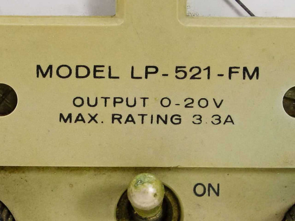 Lambda LP-521-FM model label close-up reading Output 0-20V, Max Rating 3.3A with On/Off toggle visible below