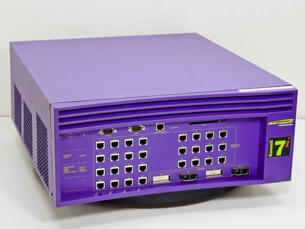 Extreme Networks Summit 7i 11702 managed Gigabit switch — front panel with 28 RJ-45 ports and GBIC slots, purple chassis