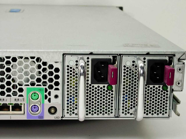 HP ProLiant DL380 rear view showing redundant hot-plug power supply bays with pink handles