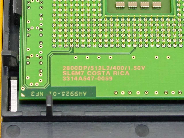 Close-up of Intel Xeon CPU markings: 2800DP/512L2/400/1.50V, SL6M7, Costa Rica, serial 3314A547-0059