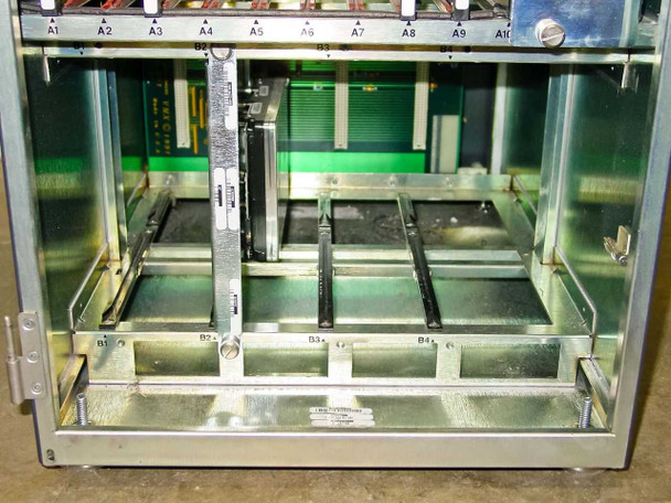 Octel VMX200 interior top-down view showing card cage slots A1–A10 and lower B-row expansion bays with hard drive and floppy drive installed