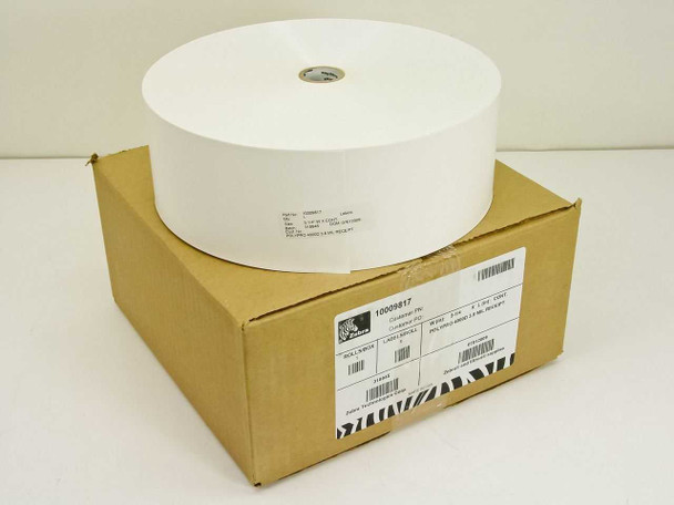 Zebra 10009817 POLYPRO 4000D receipt label roll resting on top of its brown shipping box