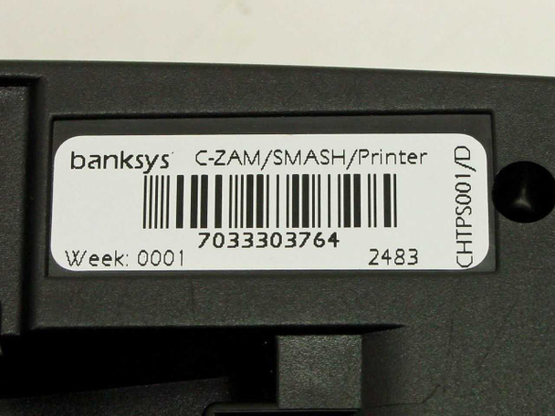 Banksys C-ZAM/SMASH/Printer label showing barcode 7033303764, Week 0001, and reference CHTPS001/D