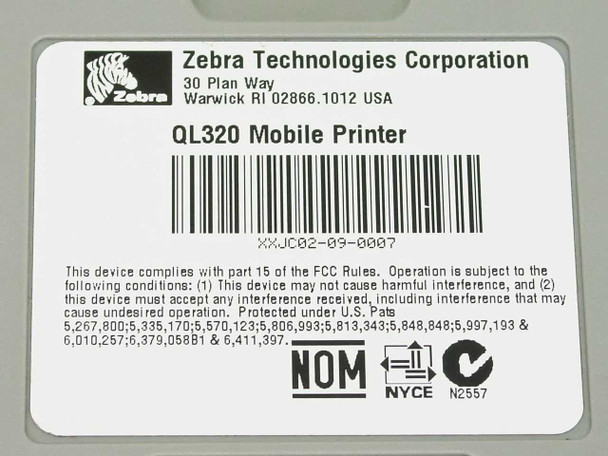 Zebra QL320 mobile printer manufacturer label showing model name and FCC compliance information